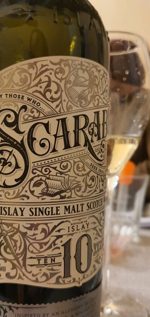 Degustazione whisky Marche: un viaggio tra i sapori della Scozia 8 scarab islay single malt